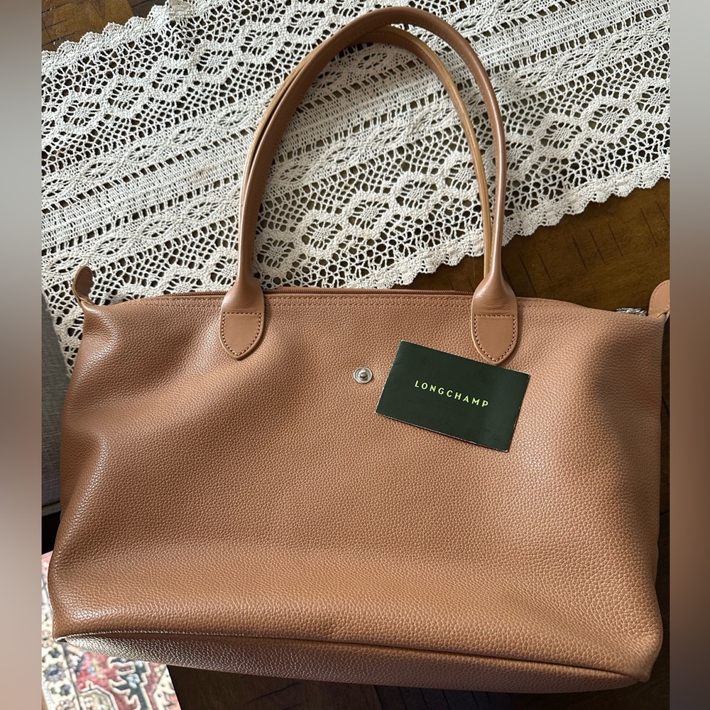 Brand new longchamp le foulonne le pliage tote. Color natural.